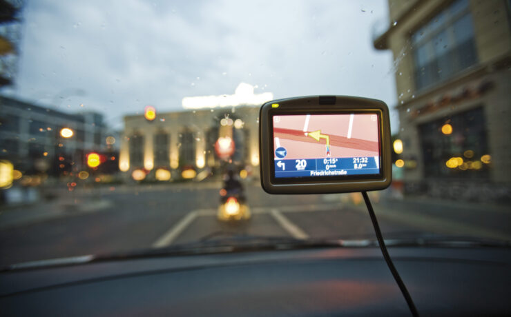 Germany, Berlin, Navigation system in car, Traffic seen through windscreen